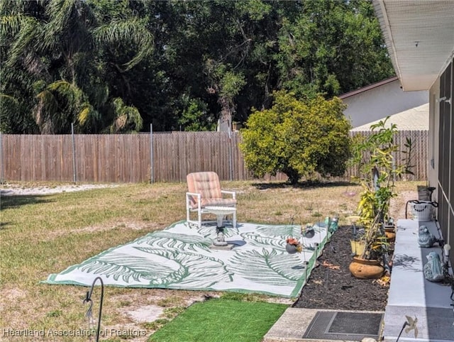 4128 Capri St, Sebring, FL 33872 - view of yard with a fenced backyard and a patio area