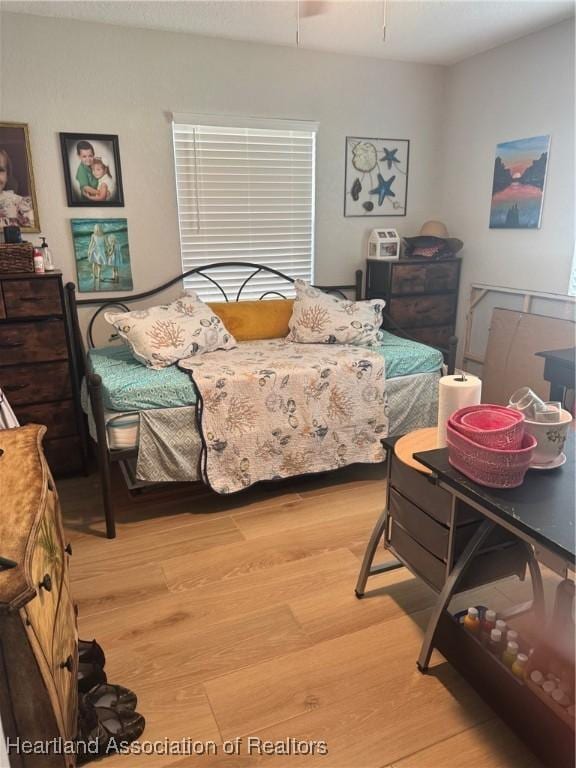 4128 Capri St, Sebring, FL 33872 - bedroom with light wood finished floors