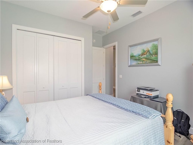 4936 Myrtle Dr, Sebring, FL 33872 - bedroom with a closet, a ceiling fan, and wood finished floors