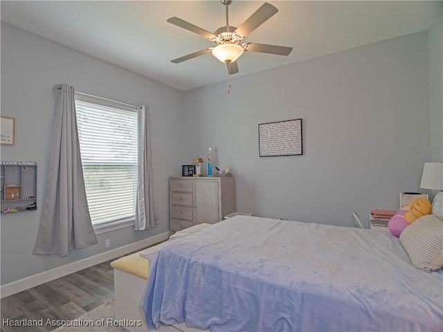 4936 Myrtle Dr, Sebring, FL 33872 - bedroom featuring wood finished floors and ceiling fan