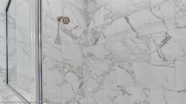 room details with a tile shower