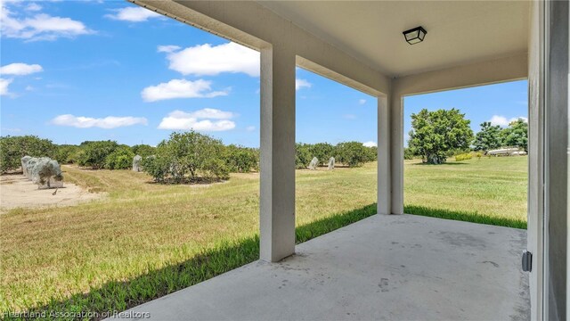 view of patio with a rural view