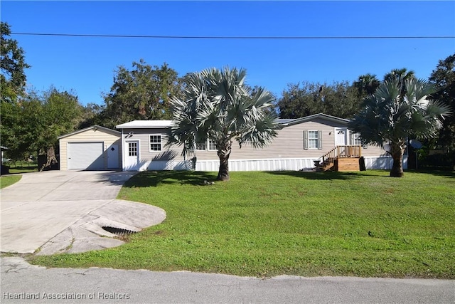 view of front facade with a front lawn and a garage