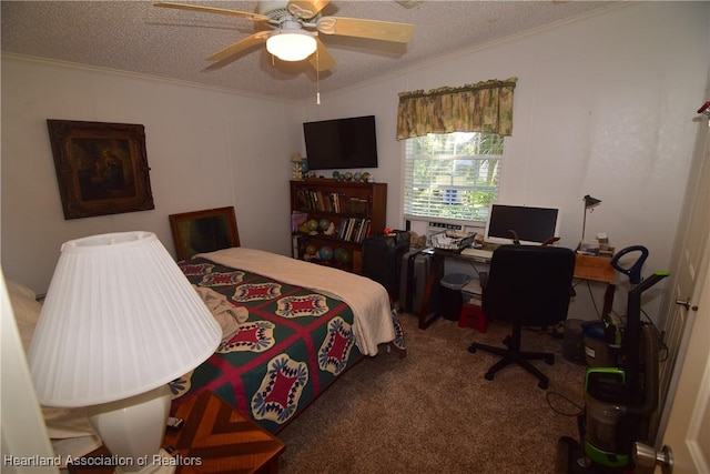 bedroom with carpet flooring, a textured ceiling, ceiling fan, and ornamental molding