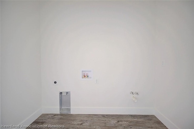 washroom with electric dryer hookup, hookup for a washing machine, and hardwood / wood-style flooring