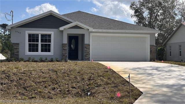 view of front of property with a garage