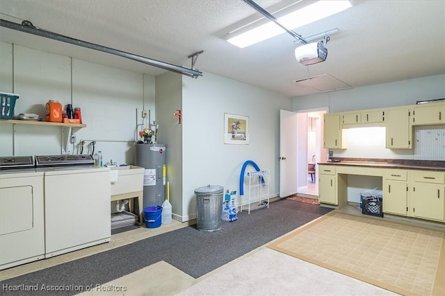 garage featuring a garage door opener, washer and clothes dryer, and water heater