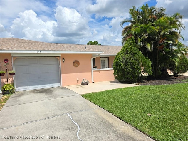 4618 Lafayette Ave, Sebring, FL 33875 - ranch-style house with stucco siding, a front yard, concrete driveway, and an attached garage