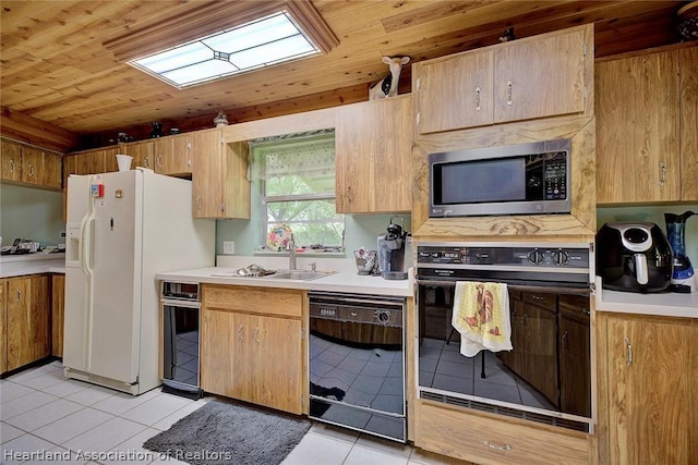 kitchen with light tile patterned floors, sink, black appliances, and wood ceiling