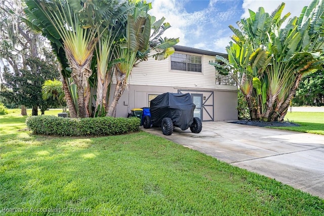 view of property exterior featuring a yard