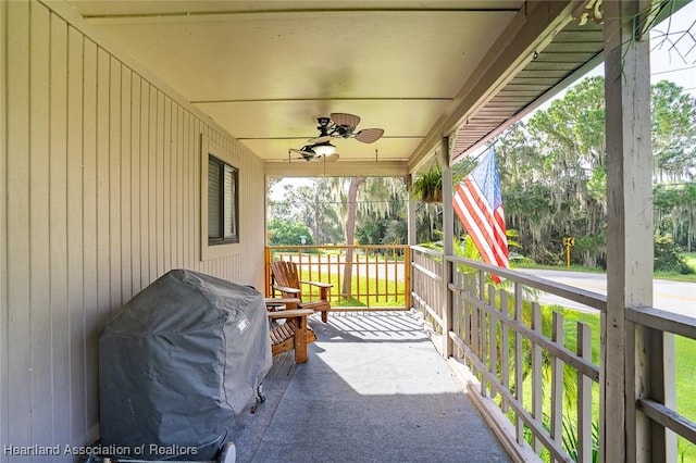 view of patio / terrace featuring ceiling fan, a grill, and covered porch