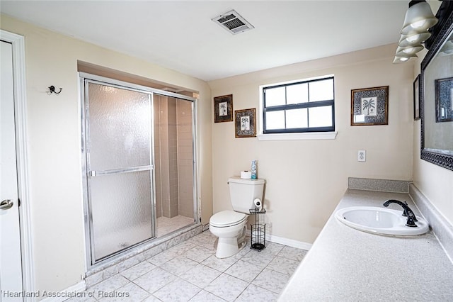 bathroom with an enclosed shower, vanity, tile patterned floors, and toilet