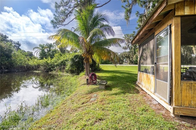 view of yard with a water view