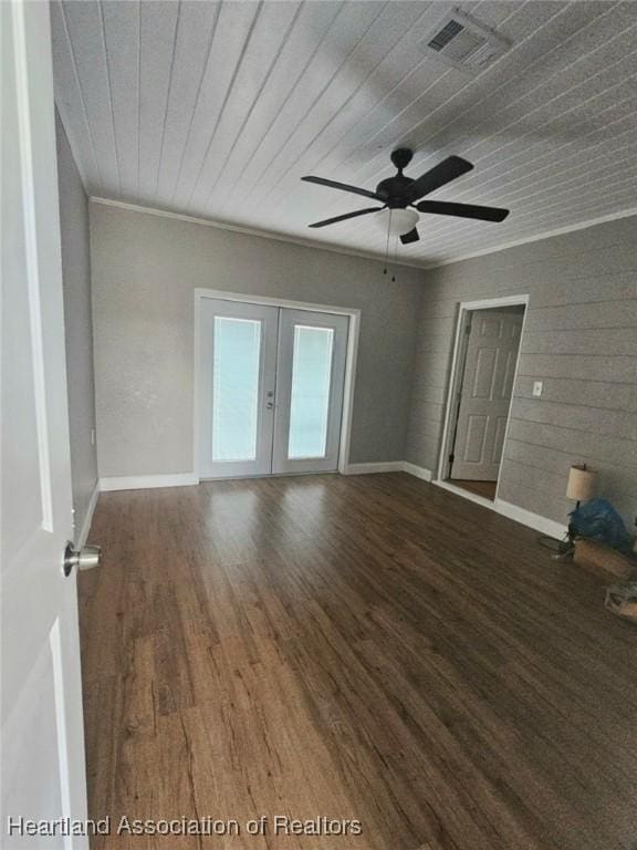 908 Taseschee Dr, Sebring, FL 33870 - unfurnished room featuring french doors, ceiling fan, wood finished floors, ornamental molding, and baseboards
