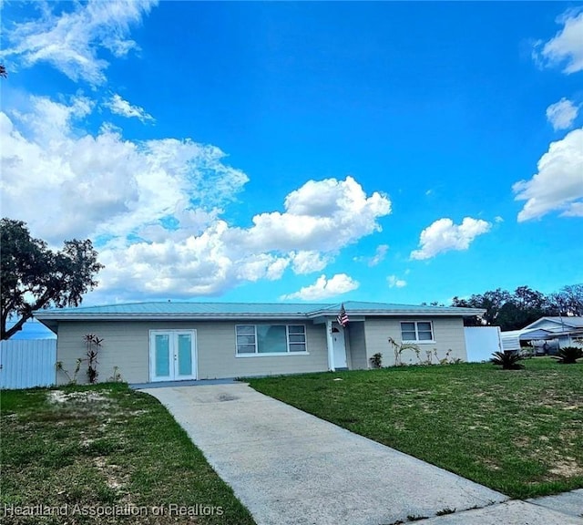 908 Taseschee Dr, Sebring, FL 33870 - ranch-style home with french doors