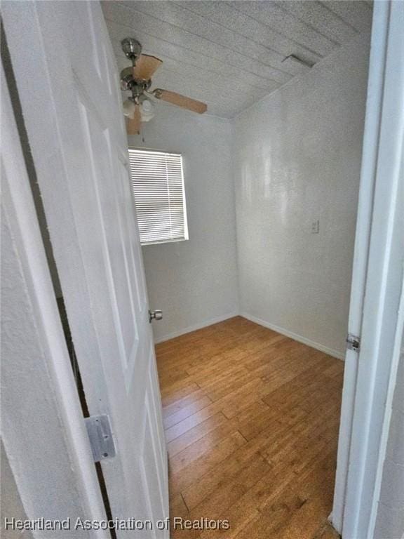 908 Taseschee Dr, Sebring, FL 33870 - spare room featuring hardwood / wood-style flooring and ceiling fan