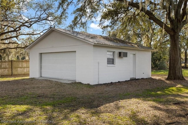 garage featuring a yard