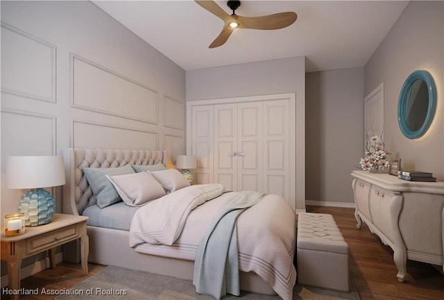 bedroom with a closet, ceiling fan, and dark wood-type flooring