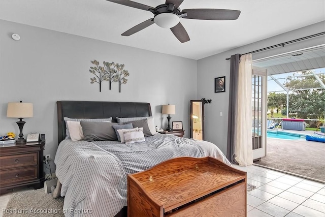 tiled bedroom featuring ceiling fan and access to outside