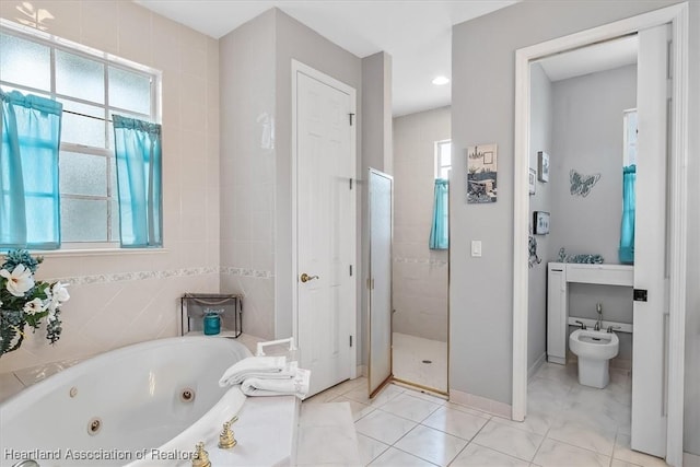 bathroom featuring plus walk in shower, a bidet, and tile patterned floors