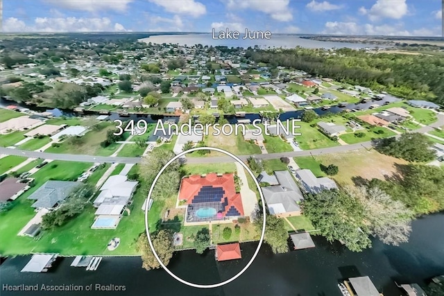 bird's eye view with a water view