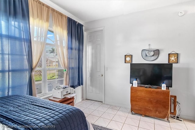 bedroom featuring tile patterned flooring