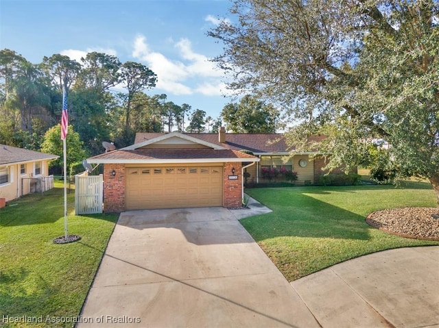 ranch-style house with a garage and a front yard