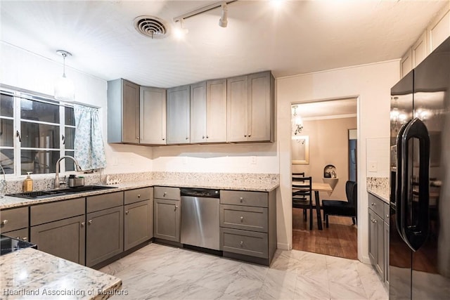 kitchen featuring visible vents, black fridge with ice dispenser, gray cabinetry, a sink, and dishwasher