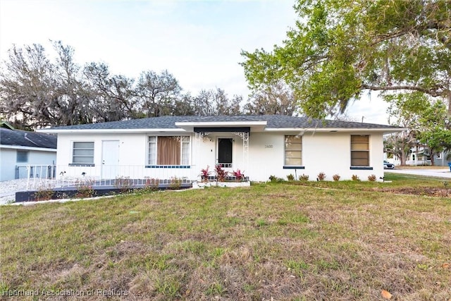 2600 Lakeview Dr, Sebring, FL 33870 - ranch-style home featuring a porch and a front lawn