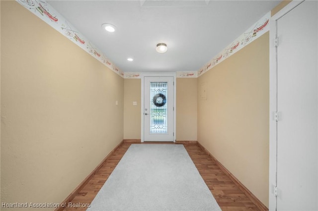 doorway featuring light hardwood / wood-style flooring