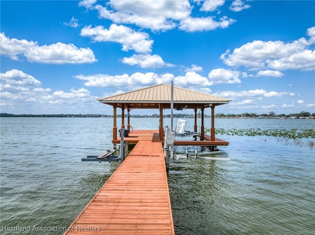 view of dock with a water view