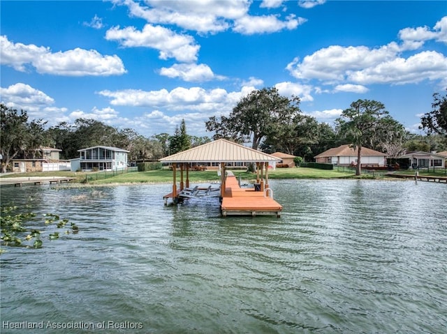 dock area with a water view