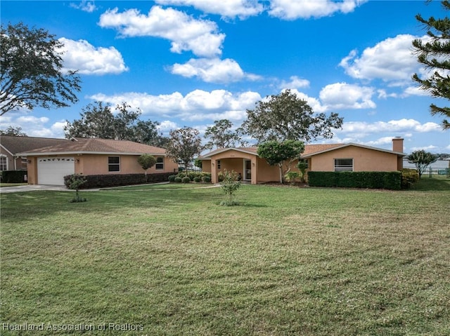 single story home featuring a front lawn and a garage