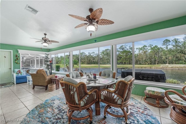 sunroom / solarium with ceiling fan