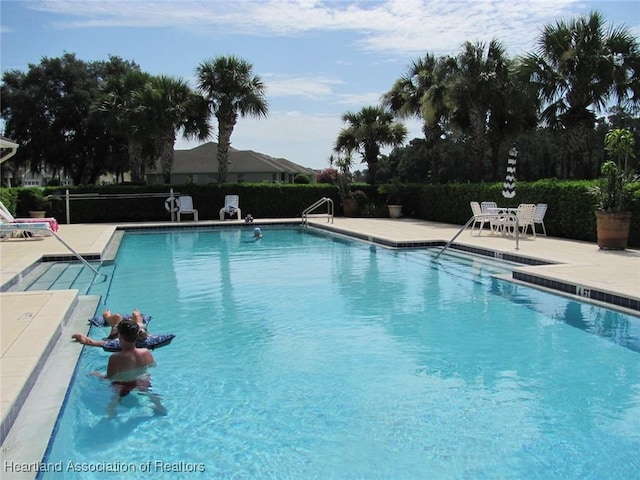 view of pool with a patio area