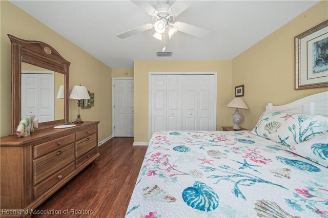 bedroom featuring ceiling fan and dark hardwood / wood-style floors