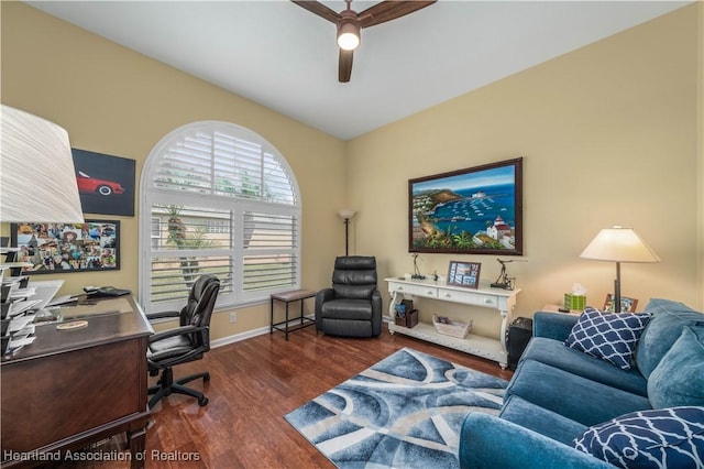 office space featuring ceiling fan and dark hardwood / wood-style flooring