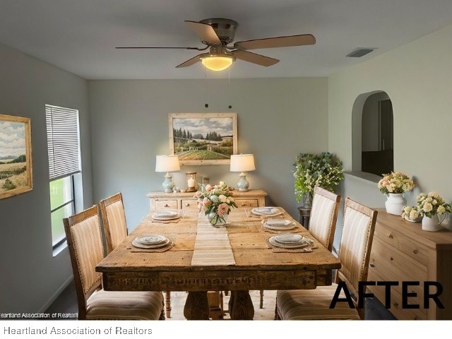 dining room featuring visible vents and a ceiling fan