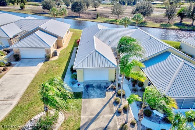 drone / aerial view with a water view