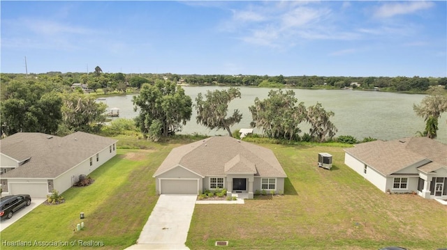 drone / aerial view with a water view