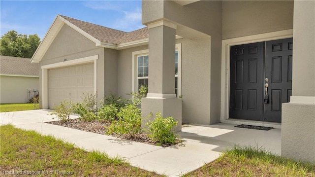 property entrance featuring a garage