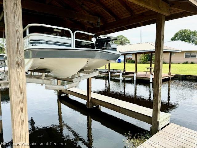 view of dock with a water view