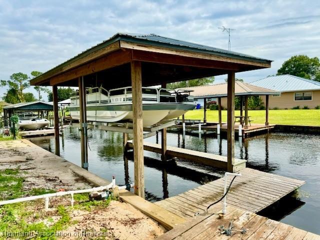 view of dock with a water view