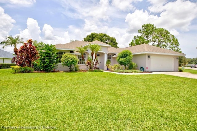 ranch-style home with a garage and a front lawn