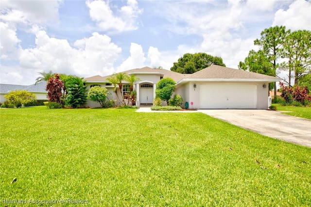 view of front facade featuring a front yard and a garage