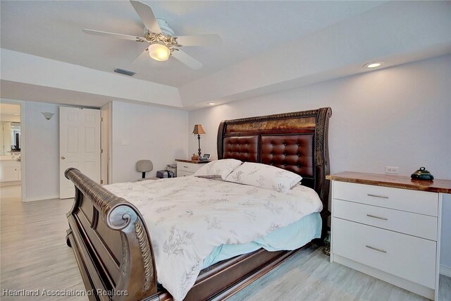 bedroom with ceiling fan and light wood-type flooring