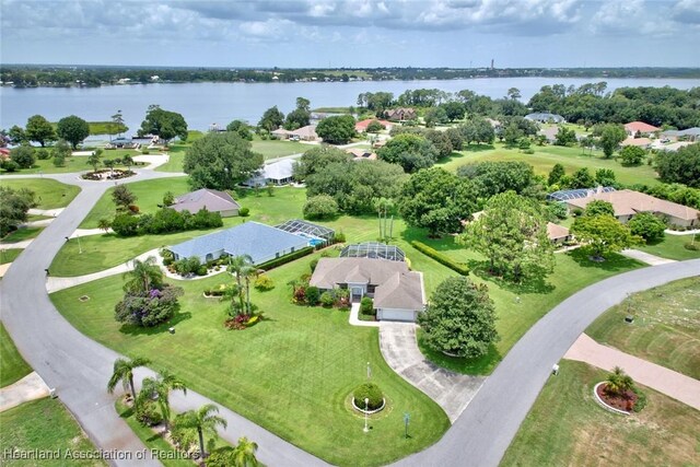 birds eye view of property featuring a water view