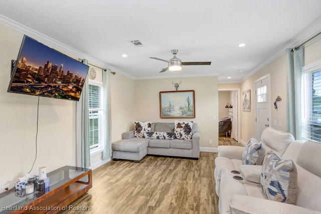 317 Old Bradenton Rd, Wauchula, FL 33873 - living room featuring ornamental molding, light wood-style flooring, a ceiling fan, baseboards, and recessed lighting