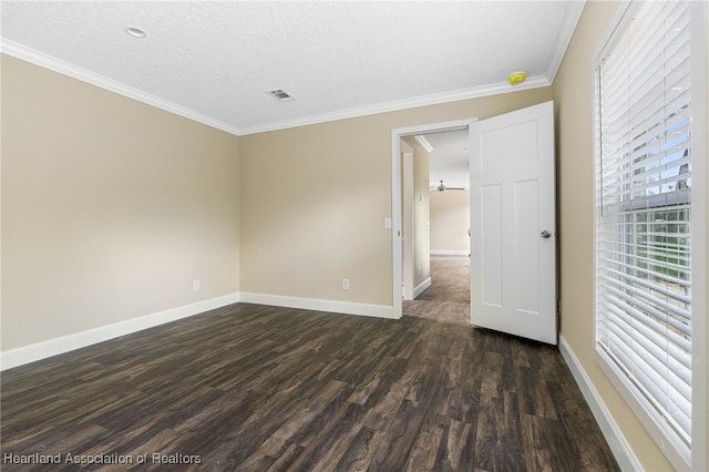317 Old Bradenton Rd, Wauchula, FL 33873 - unfurnished room with dark wood-style floors, baseboards, ornamental molding, and a smoke detector