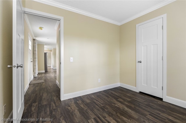 317 Old Bradenton Rd, Wauchula, FL 33873 - spare room featuring ornamental molding, dark wood-type flooring, and baseboards